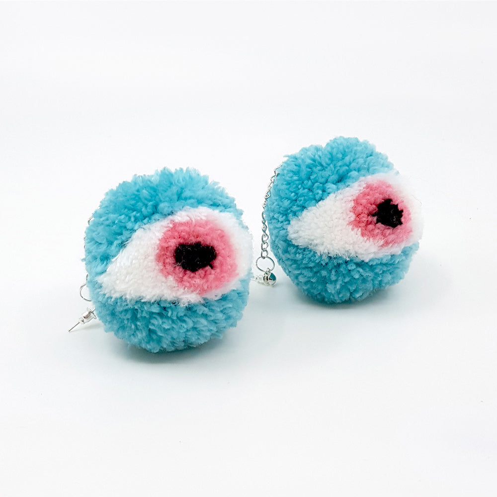 Eye Pom Pom Earrings